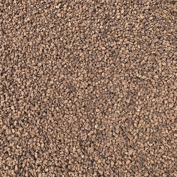 it is recommended to use a barrier or landscaping fabric before laying pea gravel to prevent it from sinking into the ground